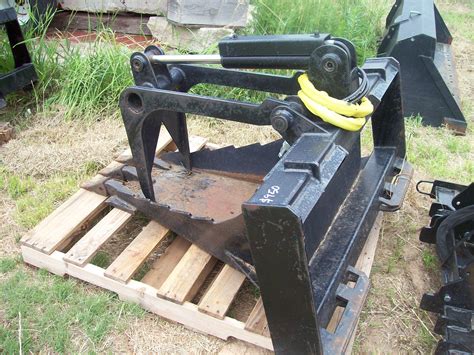 skid steer grapple for sale under 2000 dollars|used skid steer grapple attachment.